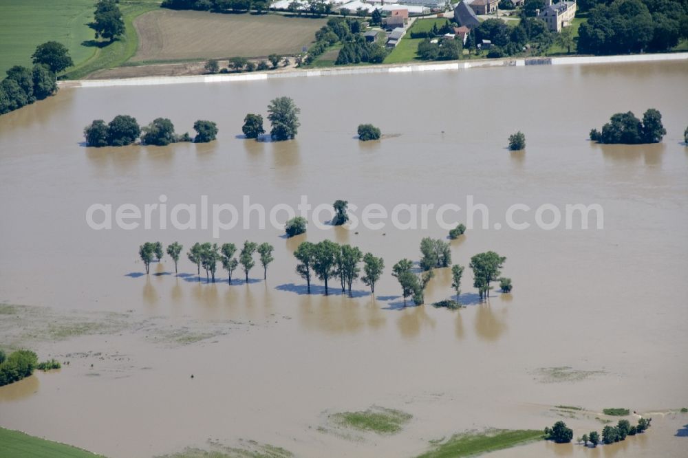 Torgau from the bird's eye view: Flood disaster flood flooding the banks of the Elbe river in the countryside near Torgau in Saxony