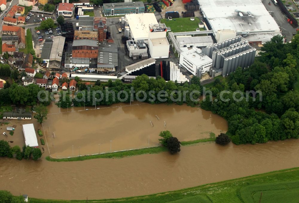 Aerial photograph Bad Köstritz - Flood disaster flood flooding the banks of the river Weiße Elster and flooding of neighborhoods in Bad Kostritz in Thuringia