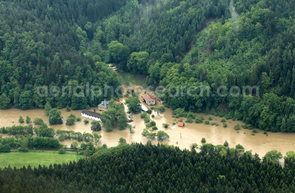 Berga from the bird's eye view: Flood disaster flood flooding the banks of the river Weiße Elster and flooding of neighborhoods in Berga in Thuringia