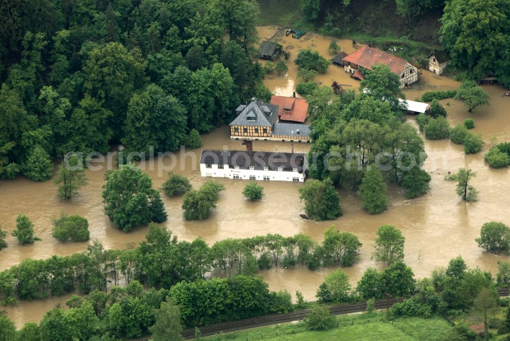 Aerial photograph Berga - Flood disaster flood flooding the banks of the river Weiße Elster and flooding of neighborhoods in Berga in Thuringia