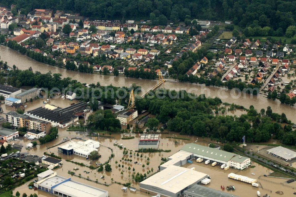 Gera from the bird's eye view: Flood disaster flood flooding the banks of the river Weiße Elster and flooding of neighborhoods in Gera in Thuringia