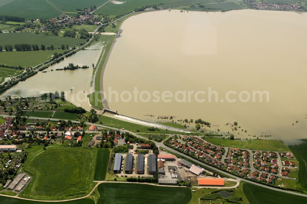 Straussfurt from above - Flood disaster flood overflow of the dam / reservoirs and storage tanks Straussfurt in Thuringia. The water runs through the overflow of the surrounding meadows and fields