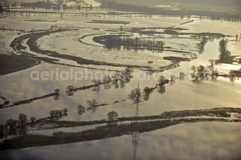 Milow from the bird's eye view: Flood situation around and in the area in Milow in the state Brandenburg, Germany