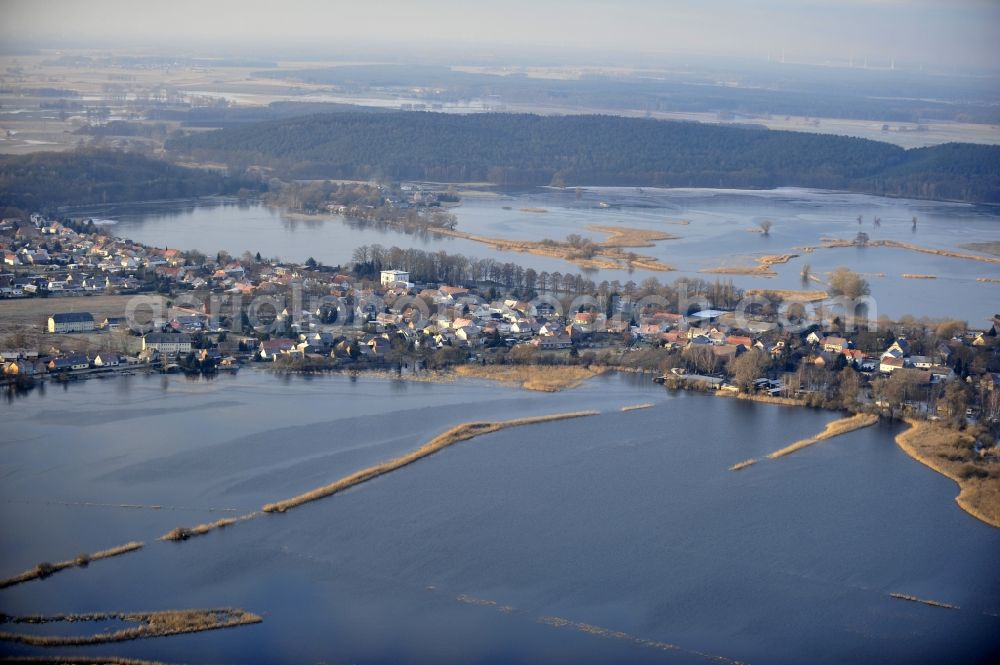 Milow from the bird's eye view: Flood situation around and in the area in Milow in the state Brandenburg, Germany