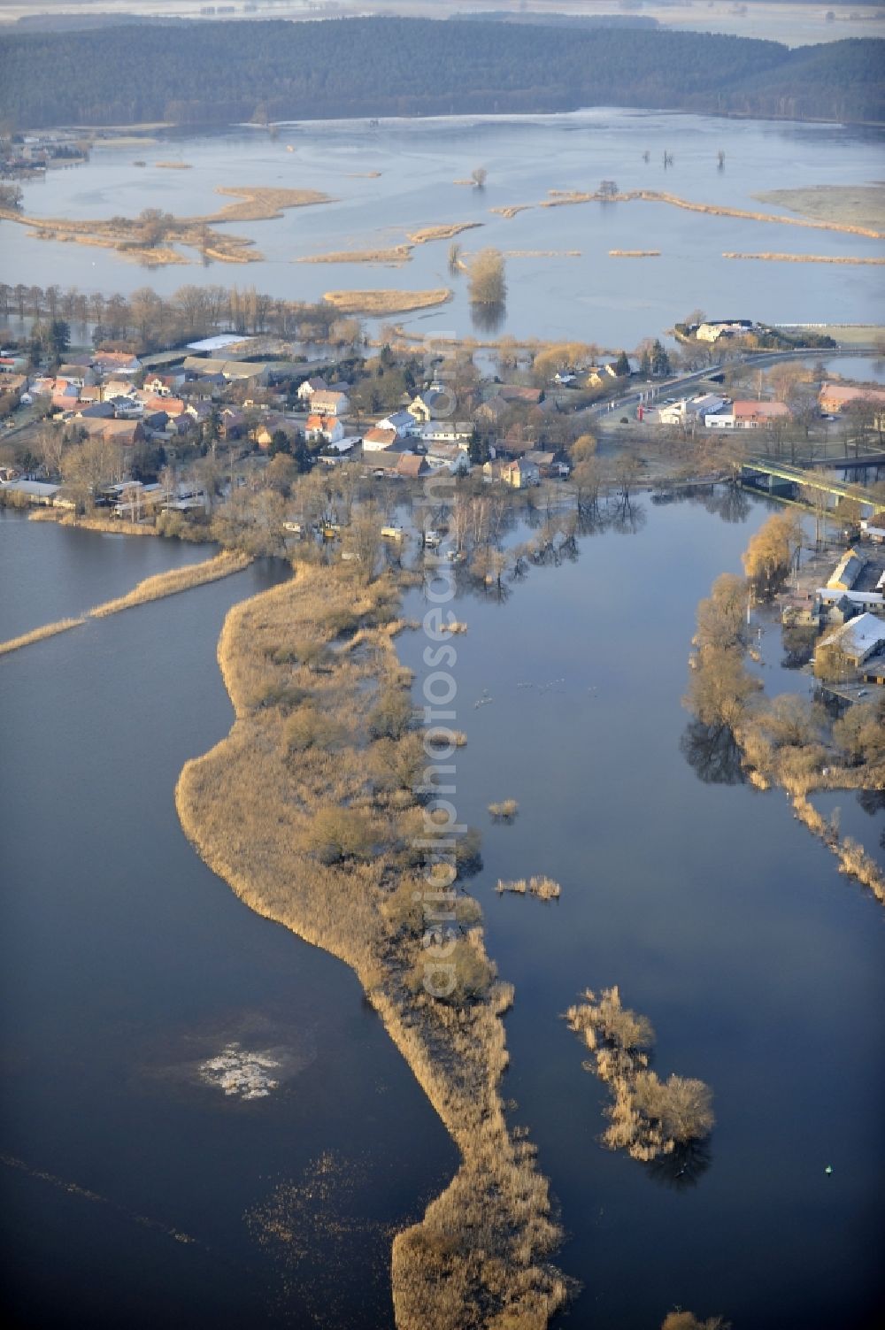 Milow from the bird's eye view: Flood situation around and in the area in Milow in the state Brandenburg, Germany