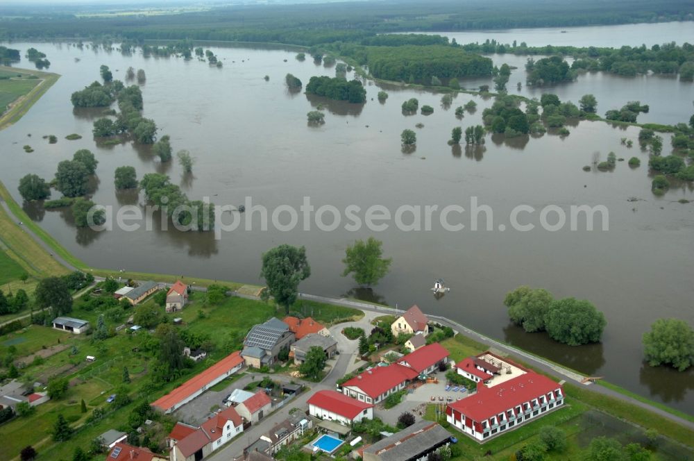 Ratzdorf from the bird's eye view: Flood situation around and in the area in Ratzdorf in the state Brandenburg, Germany