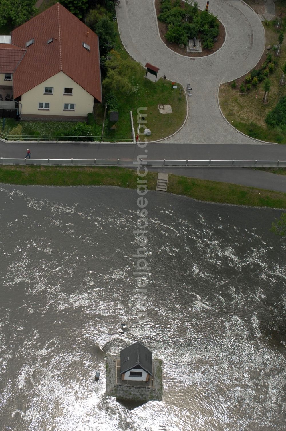 Ratzdorf from the bird's eye view: Flood situation around and in the area in Ratzdorf in the state Brandenburg, Germany