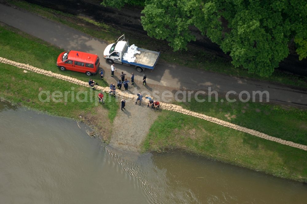 Ratzdorf from the bird's eye view: Flood situation around and in the area in Ratzdorf in the state Brandenburg, Germany