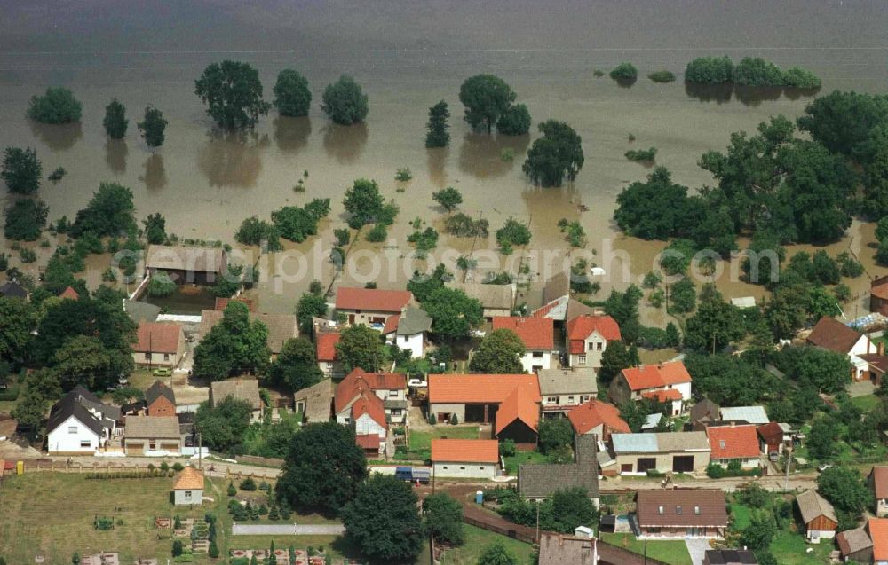 Ratzdorf from the bird's eye view: Flood situation around and in the area in Ratzdorf in the state Brandenburg, Germany