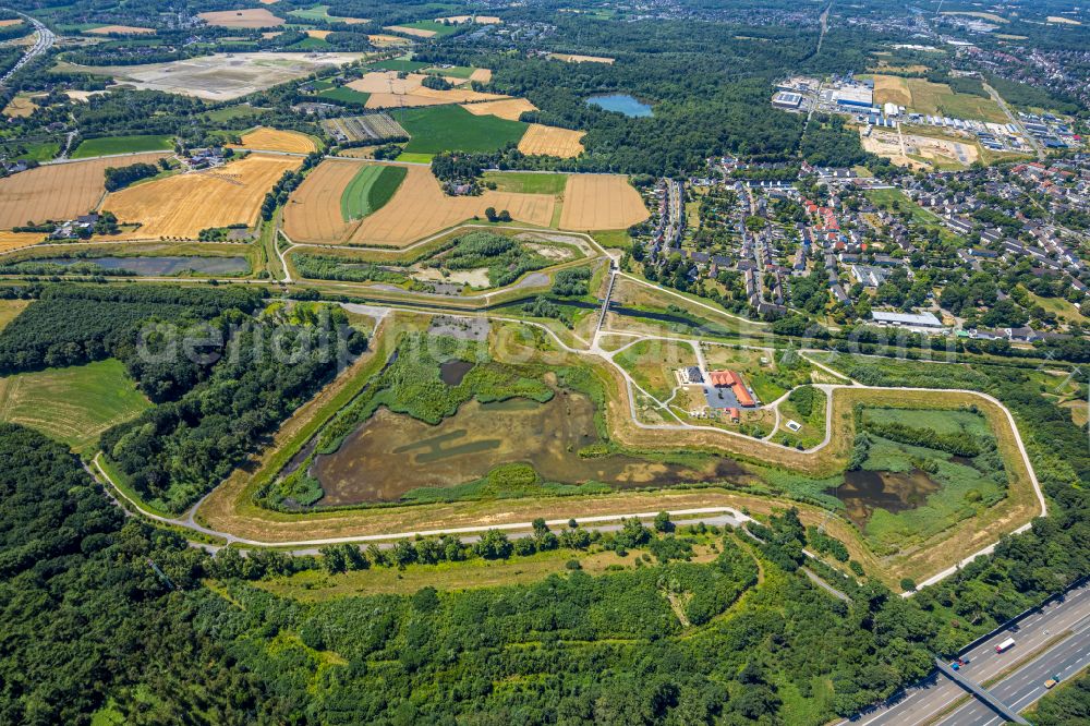 Aerial photograph Brüninghausen - Flood - retention basin - protective dam construction Hochwasserrueckhaltebecken Mengede / Emscher-Auen in Brueninghausen at Ruhrgebiet in the state North Rhine-Westphalia, Germany