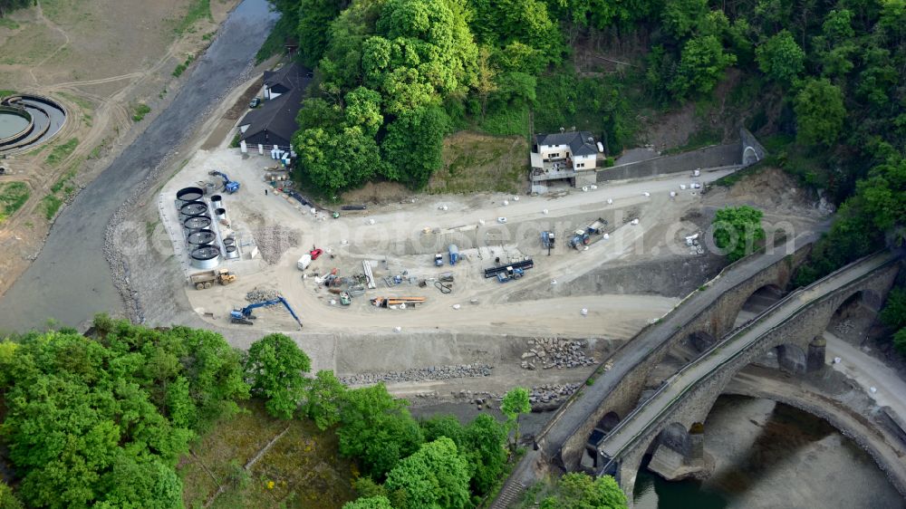 Aerial image Altenahr - Flood damage and reconstruction construction sites in the floodplain of Ahr on street Tunnelstrasse in Altenahr in the state Rhineland-Palatinate, Germany