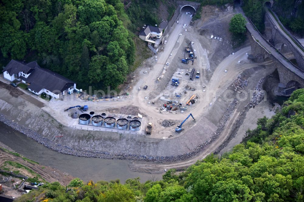 Altenahr from the bird's eye view: Flood damage and reconstruction construction sites in the floodplain of Ahr on street Tunnelstrasse in Altenahr in the state Rhineland-Palatinate, Germany