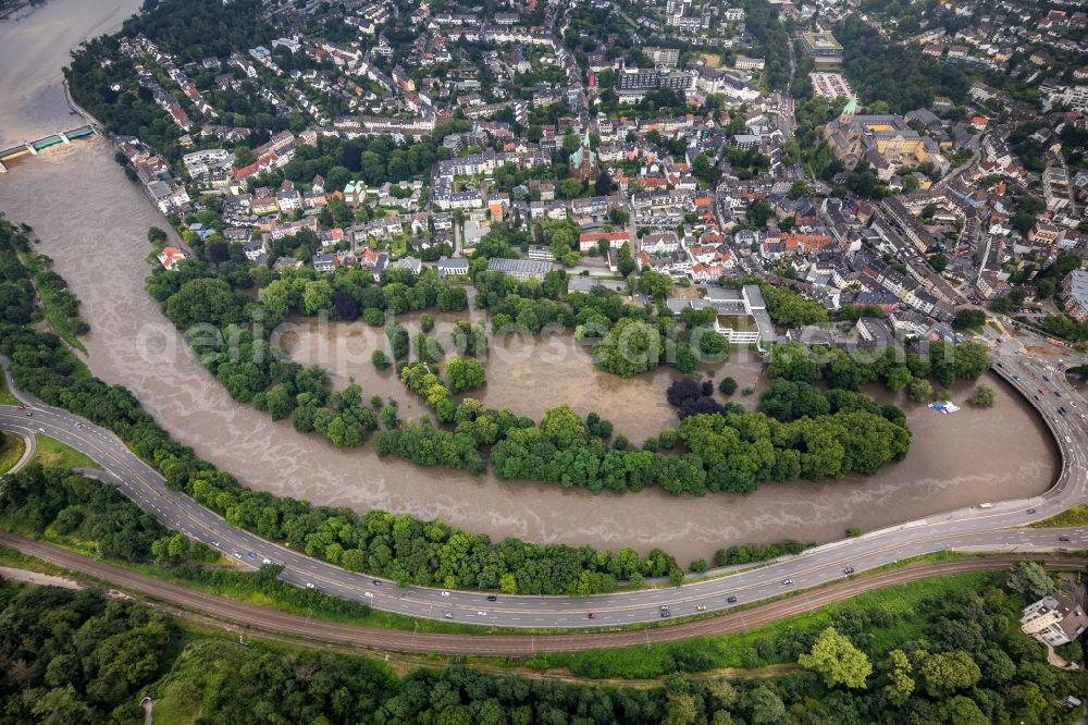 Aerial image Essen - Flood situation and flooding, all-rousing and infrastructure-destroying masses of brown water on the banks of the Ruhr in the district Werden in Essen at Ruhrgebiet in the state North Rhine-Westphalia, Germany