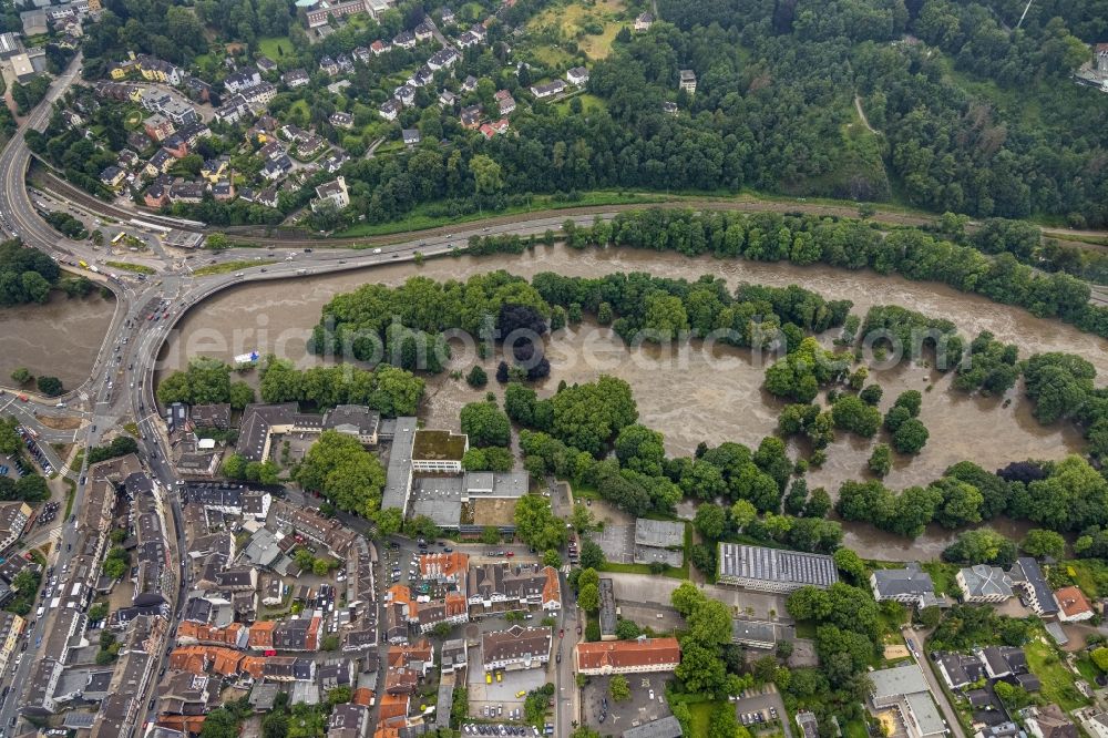 Aerial photograph Essen - Flood situation and flooding, all-rousing and infrastructure-destroying masses of brown water on the banks of the Ruhr in the district Werden in Essen at Ruhrgebiet in the state North Rhine-Westphalia, Germany