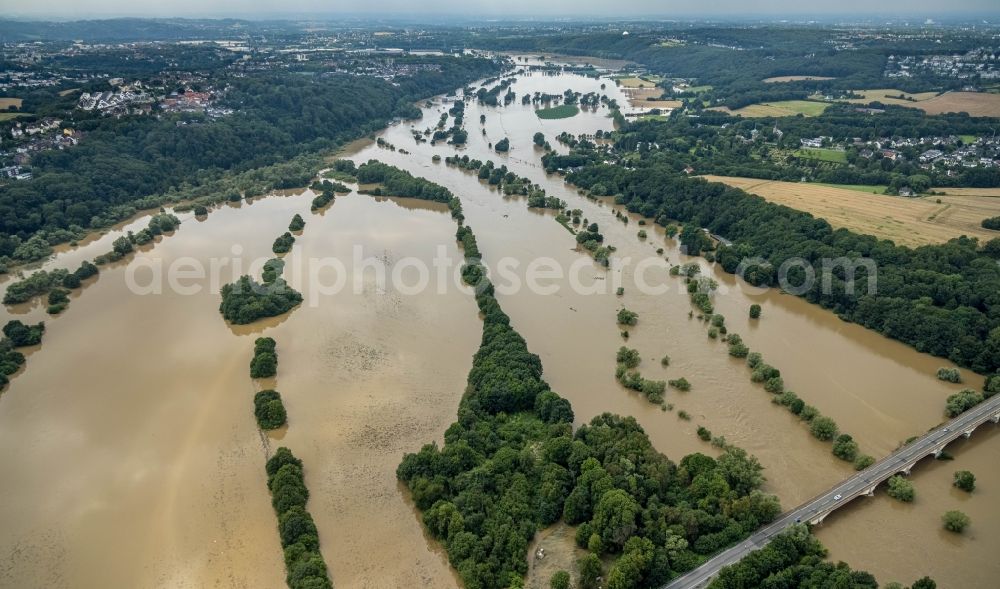 Hattingen from above - Flood situation and flooding, all-rousing and infrastructure-destroying masses of brown water along the trampled Ruhr - river course in Hattingen at Ruhrgebiet in the state North Rhine-Westphalia, Germany