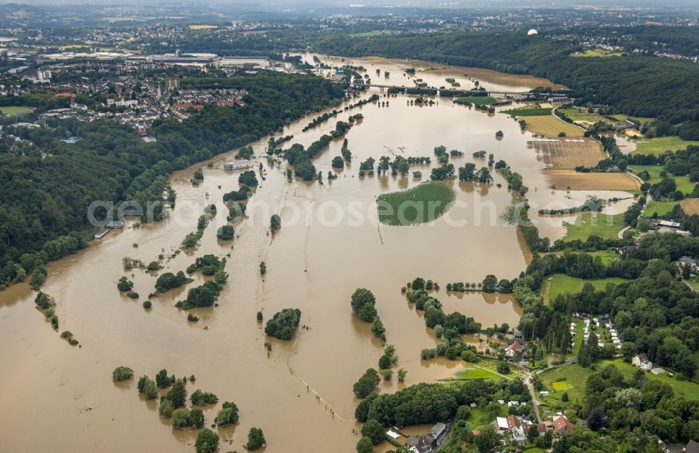 Aerial photograph Hattingen - Flood situation and flooding, all-rousing and infrastructure-destroying masses of brown water along the trampled Ruhr - river course in Hattingen at Ruhrgebiet in the state North Rhine-Westphalia, Germany