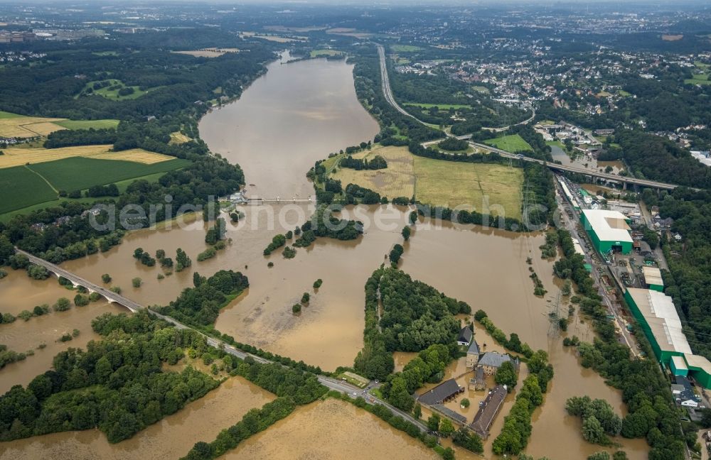 Aerial image Hattingen - Flood situation and flooding, all-rousing and infrastructure-destroying masses of brown water along the trampled Ruhr - river course in Hattingen at Ruhrgebiet in the state North Rhine-Westphalia, Germany