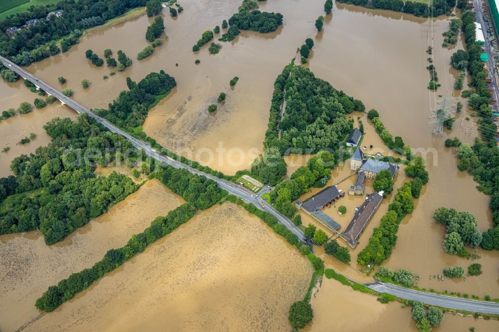 Aerial photograph Hattingen - Flood situation and flooding, all-rousing and infrastructure-destroying masses of brown water along the trampled Ruhr - river course in Hattingen at Ruhrgebiet in the state North Rhine-Westphalia, Germany