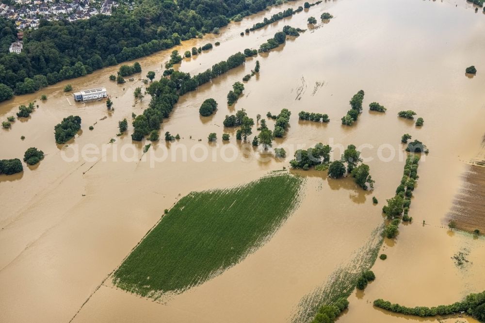 Aerial image Hattingen - Flood situation and flooding, all-rousing and infrastructure-destroying masses of brown water along the trampled Ruhr - river course in Hattingen at Ruhrgebiet in the state North Rhine-Westphalia, Germany