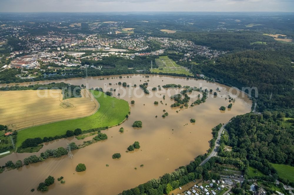 Hattingen from the bird's eye view: Flood situation and flooding, all-rousing and infrastructure-destroying masses of brown water along the Ruhr in Hattingen at Ruhrgebiet in the state North Rhine-Westphalia, Germany