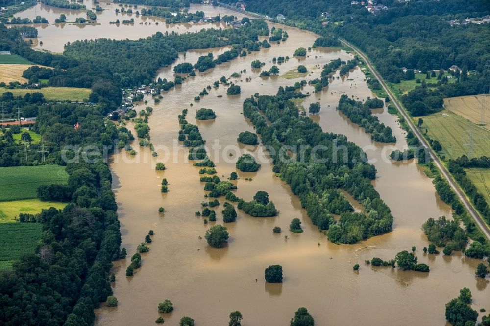 Hattingen from the bird's eye view: Flood situation and flooding, all-rousing and infrastructure-destroying masses of brown water along the Ruhr in Hattingen at Ruhrgebiet in the state North Rhine-Westphalia, Germany