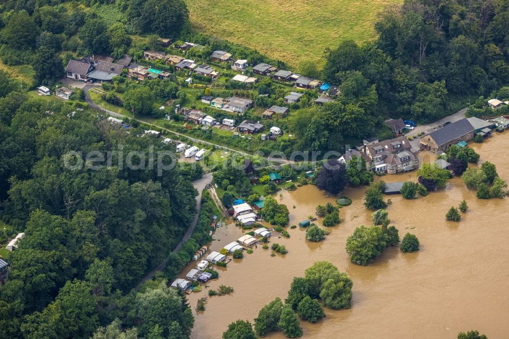 Hattingen from above - Flood situation and flooding, all-rousing and infrastructure-destroying masses of brown water along the Ruhr in Hattingen at Ruhrgebiet in the state North Rhine-Westphalia, Germany