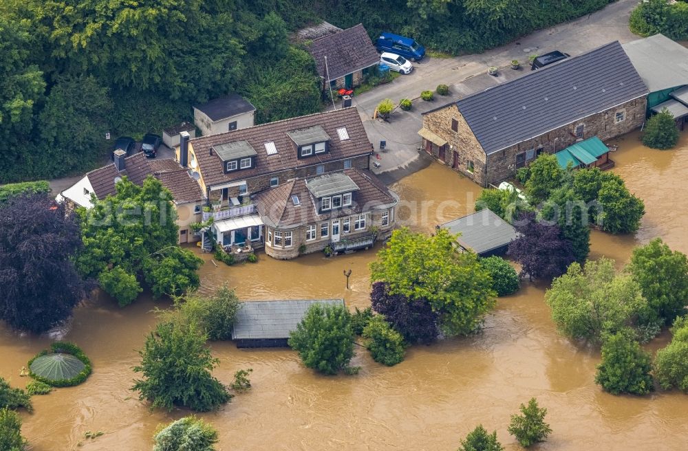 Aerial image Hattingen - Flood situation and flooding, all-rousing and infrastructure-destroying masses of brown water along the Ruhr in Hattingen at Ruhrgebiet in the state North Rhine-Westphalia, Germany