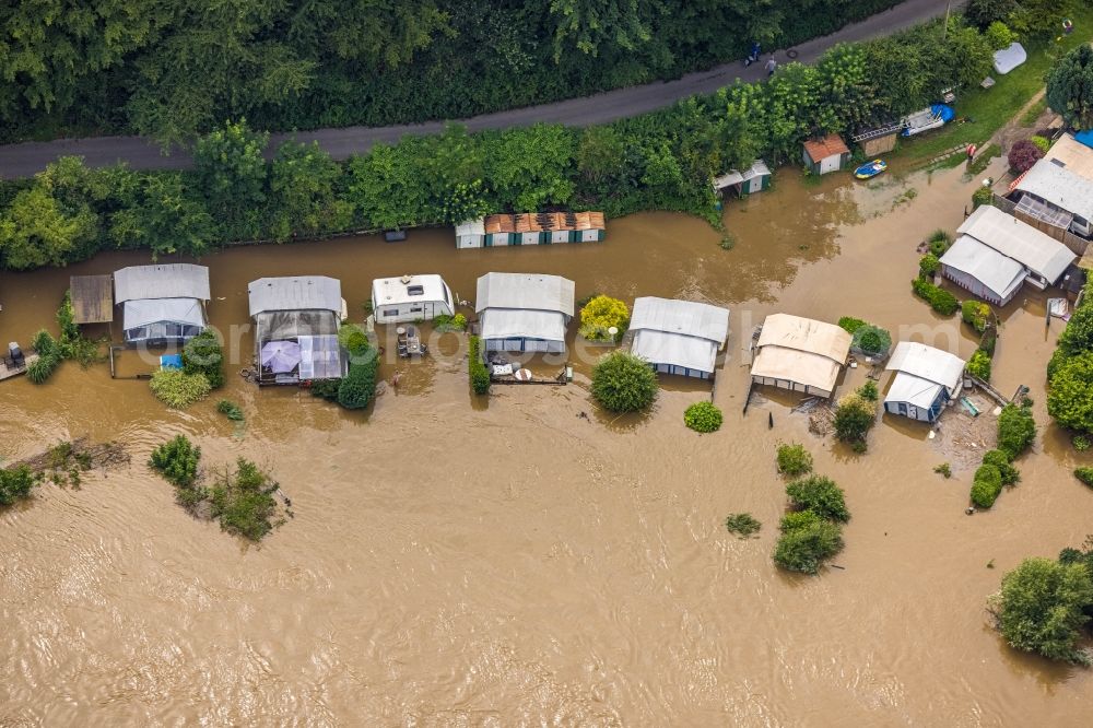 Aerial photograph Hattingen - Flood situation and flooding, all-rousing and infrastructure-destroying masses of brown water along the Ruhr in Hattingen at Ruhrgebiet in the state North Rhine-Westphalia, Germany