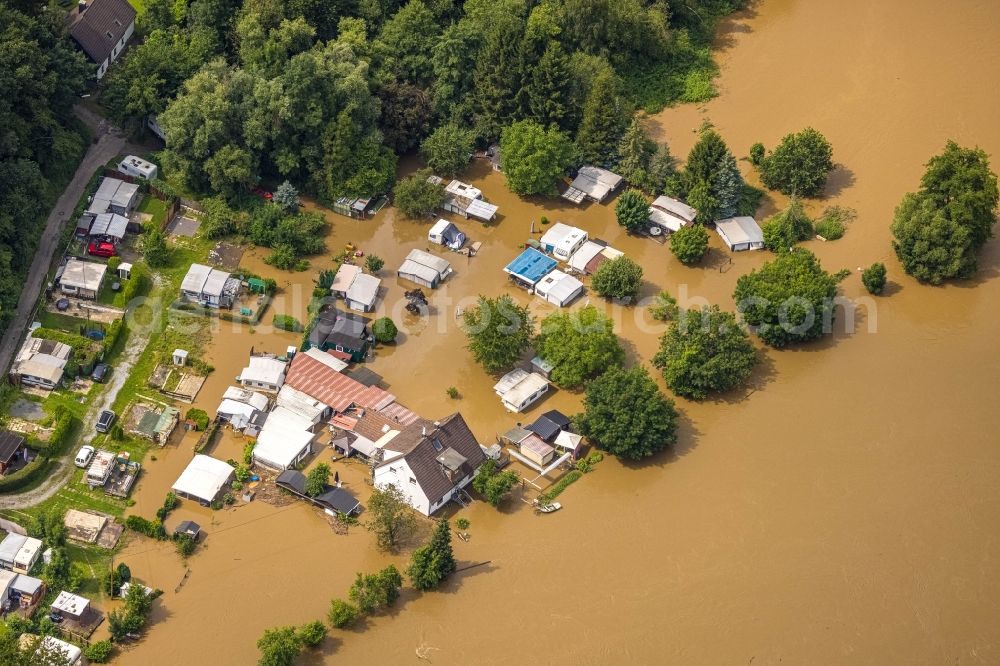 Hattingen from above - Flood situation and flooding, all-rousing and infrastructure-destroying masses of brown water along the Ruhr in Hattingen at Ruhrgebiet in the state North Rhine-Westphalia, Germany