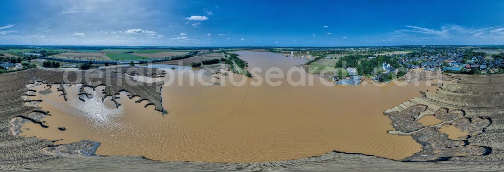 Erftstadt from the bird's eye view: Flood situation and flooding, all-rousing and infrastructure-destroying masses of brown water in Erftstadt in the state North Rhine-Westphalia, Germany