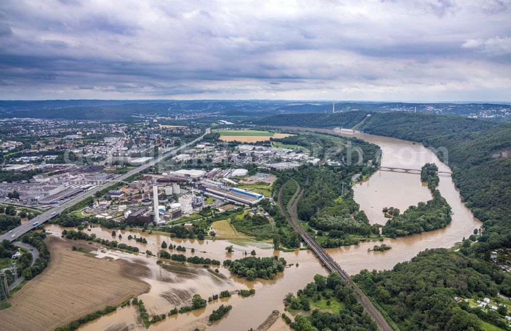 Aerial photograph Hagen - Flood situation and flooding, all-rousing and infrastructure-destroying masses of brown water on the course of the river Lenne in Hagen at Ruhrgebiet in the state North Rhine-Westphalia, Germany