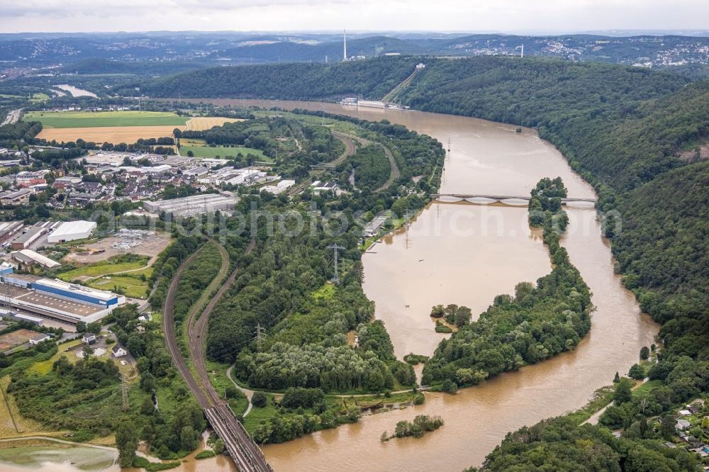 Aerial image Hagen - Flood situation and flooding, all-rousing and infrastructure-destroying masses of brown water on the course of the river Lenne in Hagen at Ruhrgebiet in the state North Rhine-Westphalia, Germany