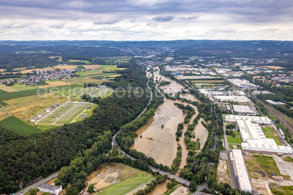 Aerial photograph Hagen - Flood situation and flooding, all-rousing and infrastructure-destroying masses of brown water on the course of the river Lenne in Hagen at Ruhrgebiet in the state North Rhine-Westphalia, Germany