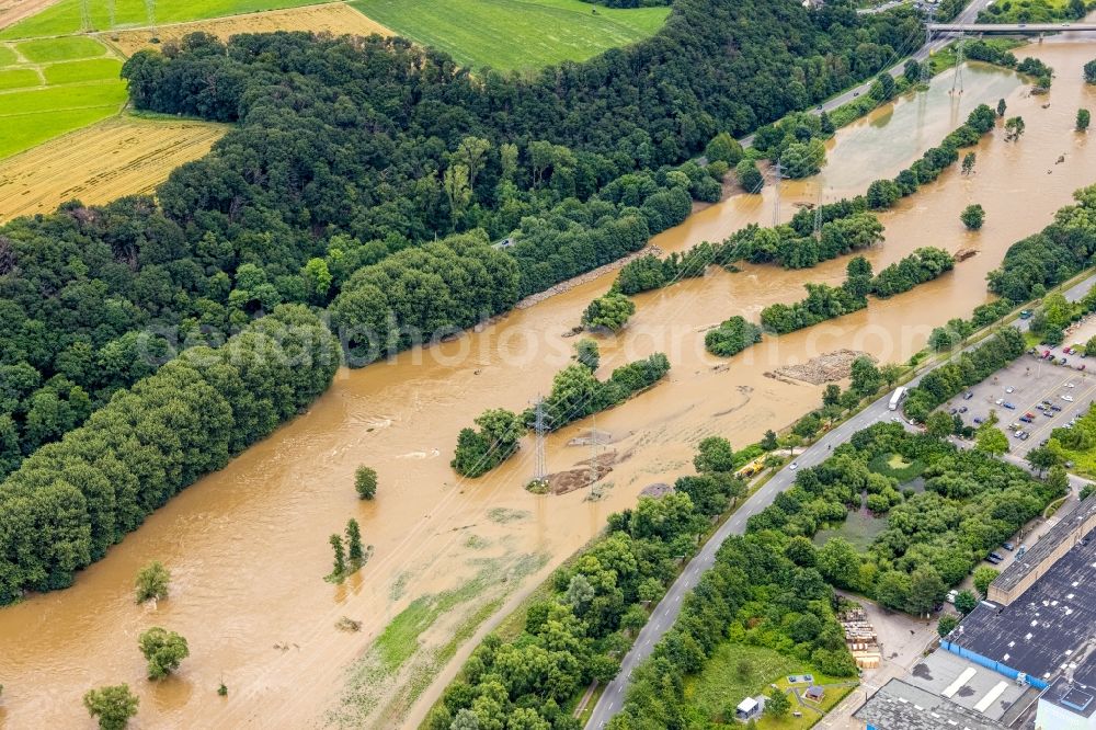 Aerial image Hagen - Flood situation and flooding, all-rousing and infrastructure-destroying masses of brown water on the course of the river Lenne in Hagen at Ruhrgebiet in the state North Rhine-Westphalia, Germany