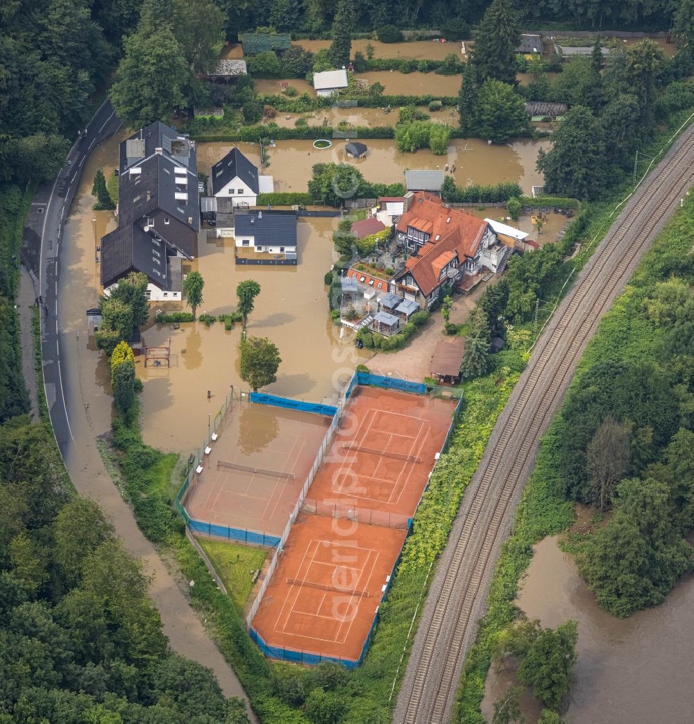 Aerial image Essen - Flood situation and flooding, all-rousing and infrastructure-destroying masses of brown water on the course of the river Ruhr in the district Kettwig in Essen at Ruhrgebiet in the state North Rhine-Westphalia, Germany