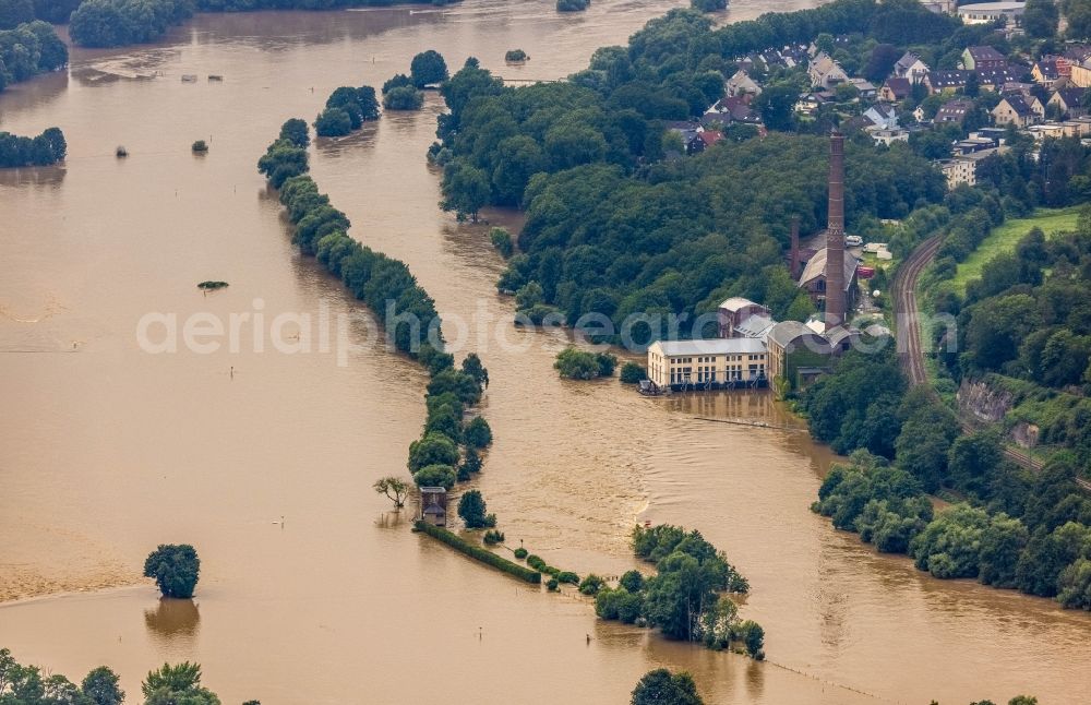 Aerial photograph Essen - Flood situation and flooding, all-rousing and infrastructure-destroying masses of brown water on the course of the river Ruhr in the district Ueberruhr - Hinsel in Essen at Ruhrgebiet in the state North Rhine-Westphalia, Germany