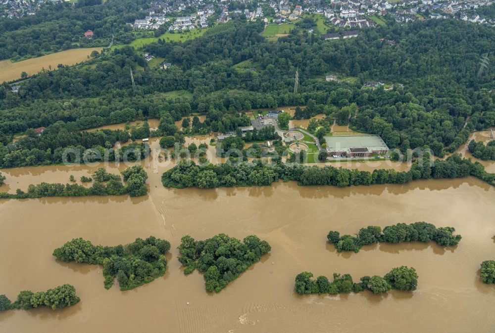 Aerial photograph Essen - Flood situation and flooding, all-rousing and infrastructure-destroying masses of brown water on the course of the river Ruhr in the district Ueberruhr - Hinsel in Essen at Ruhrgebiet in the state North Rhine-Westphalia, Germany