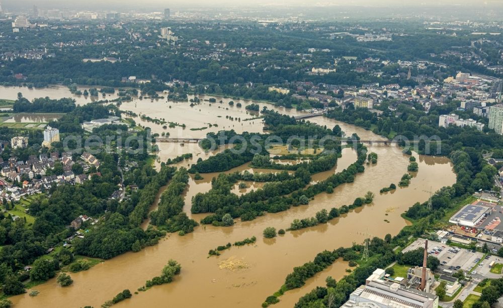 Aerial image Essen - Flood situation and flooding, all-rousing and infrastructure-destroying masses of brown water on the course of the river Ruhr in the district Ueberruhr - Hinsel in Essen at Ruhrgebiet in the state North Rhine-Westphalia, Germany