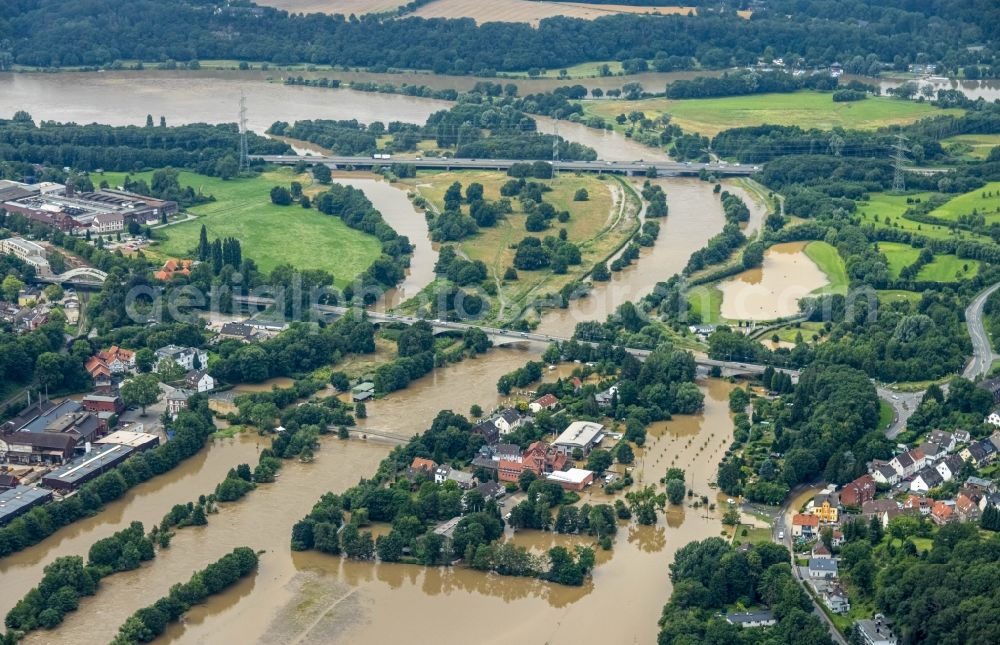 Witten from above - Flood situation and flooding, all-rousing and infrastructure-destroying masses of brown water on the course of the river Ruhr In der Lake in Witten at Ruhrgebiet in the state North Rhine-Westphalia, Germany