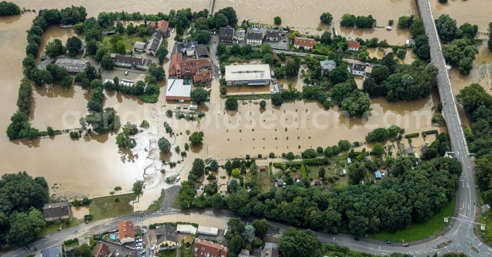 Aerial image Witten - Flood situation and flooding, all-rousing and infrastructure-destroying masses of brown water on the course of the river Ruhr In der Lake in Witten at Ruhrgebiet in the state North Rhine-Westphalia, Germany