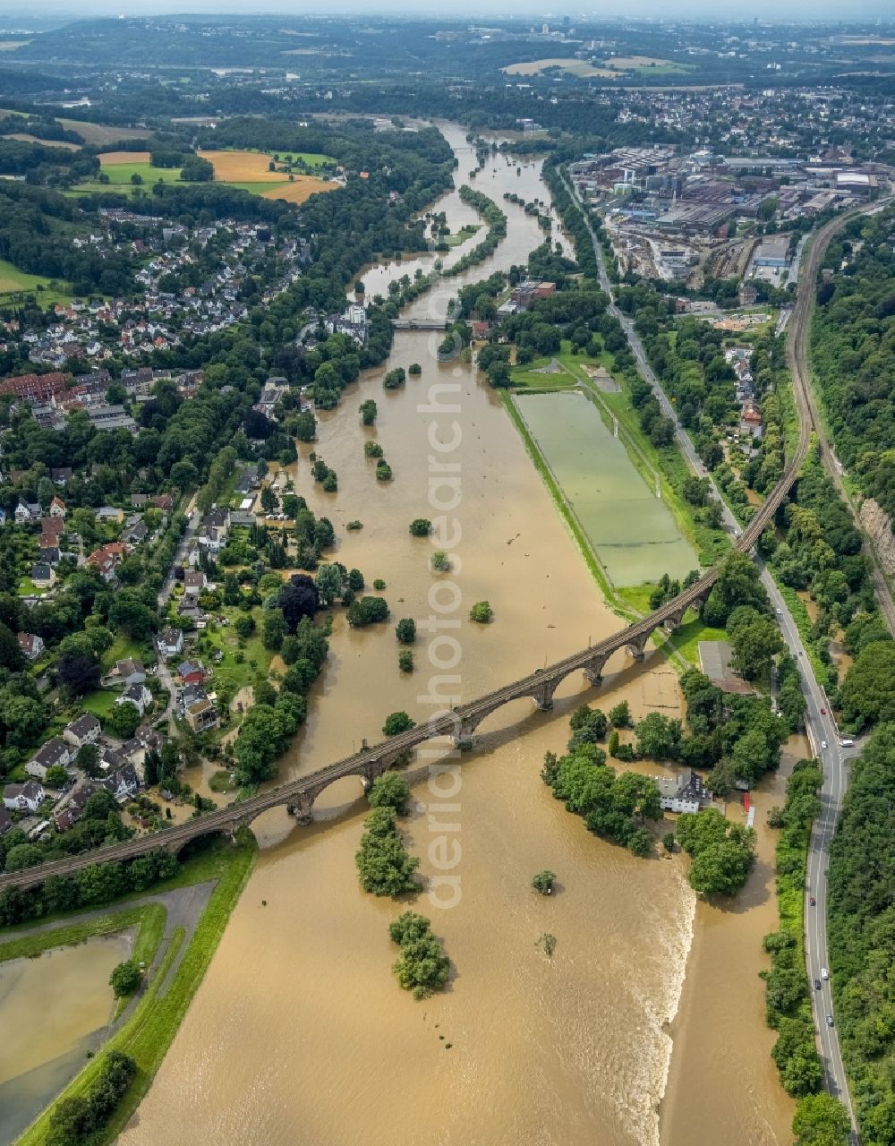 Witten from above - Flood situation and flooding, all-rousing and infrastructure-destroying masses of brown water on the course of the river Ruhr in Witten at Ruhrgebiet in the state North Rhine-Westphalia, Germany