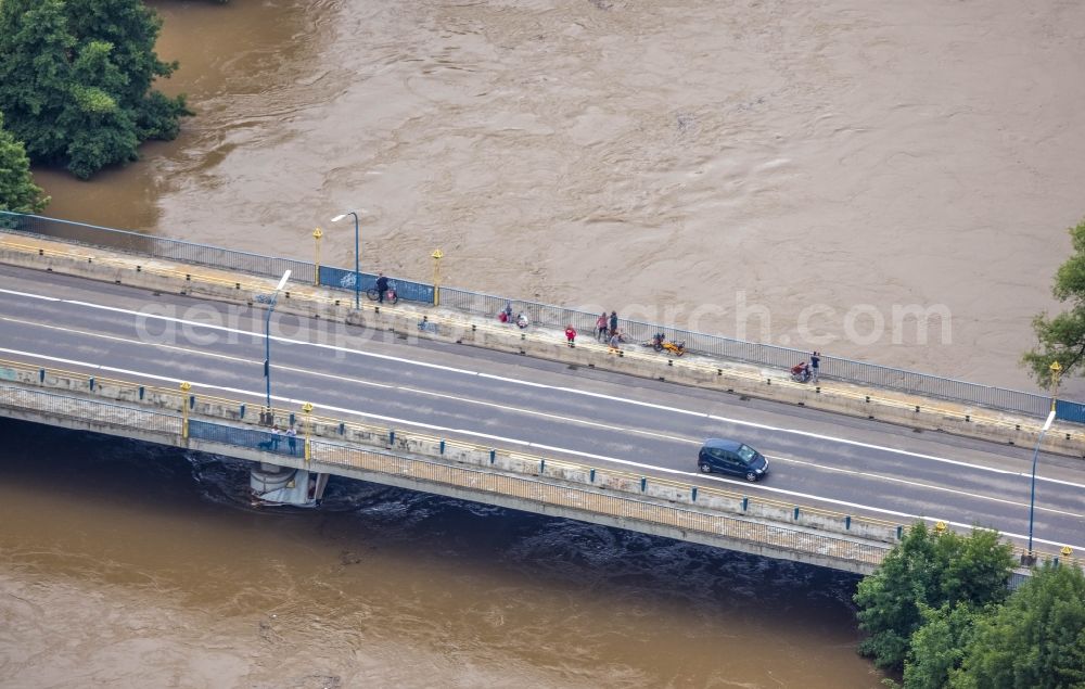 Aerial image Witten - Flood situation and flooding, all-rousing and infrastructure-destroying masses of brown water on the course of the river Ruhr in Witten at Ruhrgebiet in the state North Rhine-Westphalia, Germany