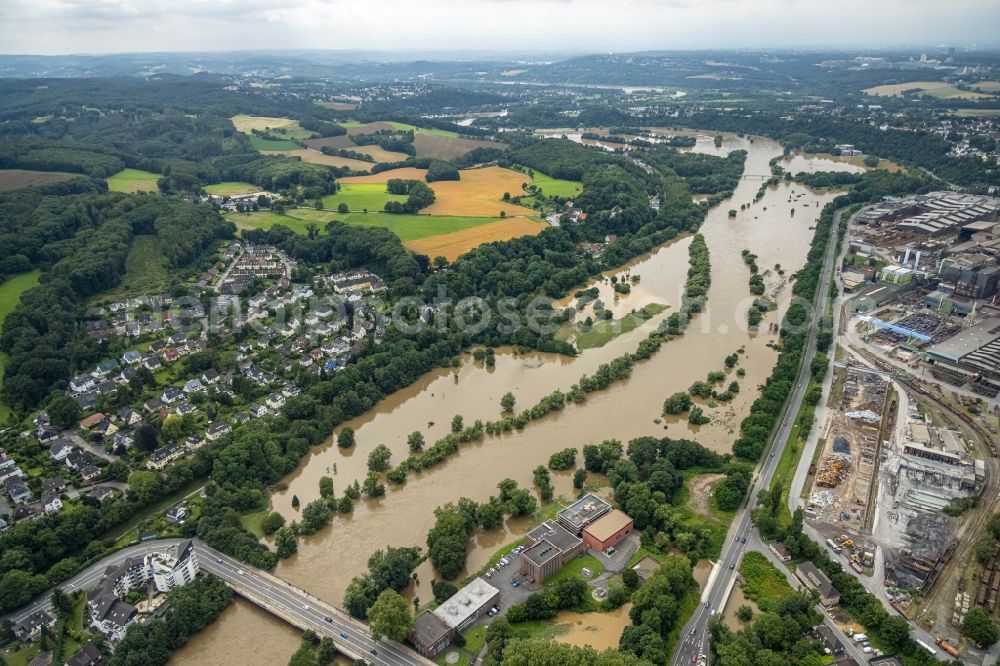 Witten from above - Flood situation and flooding, all-rousing and infrastructure-destroying masses of brown water on the course of the river Ruhr in Witten at Ruhrgebiet in the state North Rhine-Westphalia, Germany