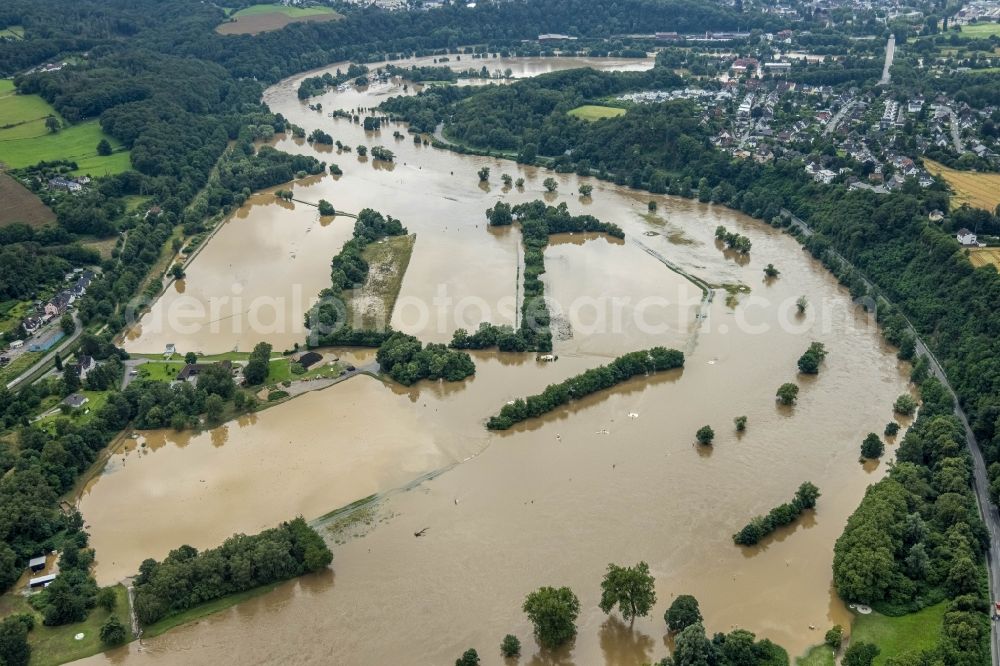 Aerial image Witten - Flood situation and flooding, all-rousing and infrastructure-destroying masses of brown water on the course of the river Ruhr in Witten at Ruhrgebiet in the state North Rhine-Westphalia, Germany