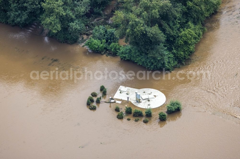 Aerial photograph Witten - Flood situation and flooding, all-rousing and infrastructure-destroying masses of brown water on the course of the river Ruhr in Witten at Ruhrgebiet in the state North Rhine-Westphalia, Germany