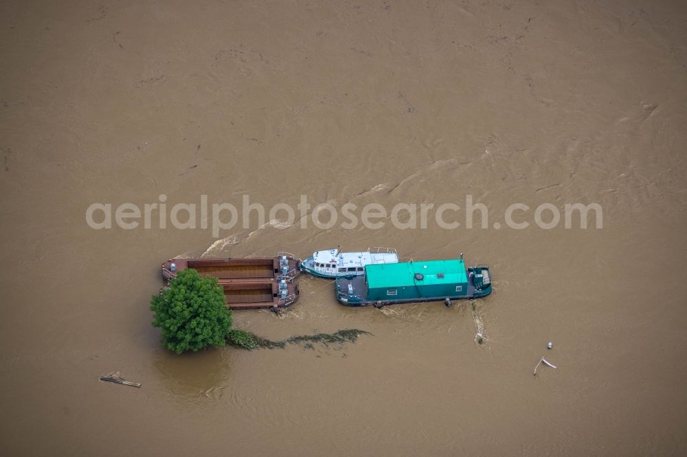 Witten from above - Flood situation and flooding, all-rousing and infrastructure-destroying masses of brown water on the course of the river Ruhr in Witten at Ruhrgebiet in the state North Rhine-Westphalia, Germany