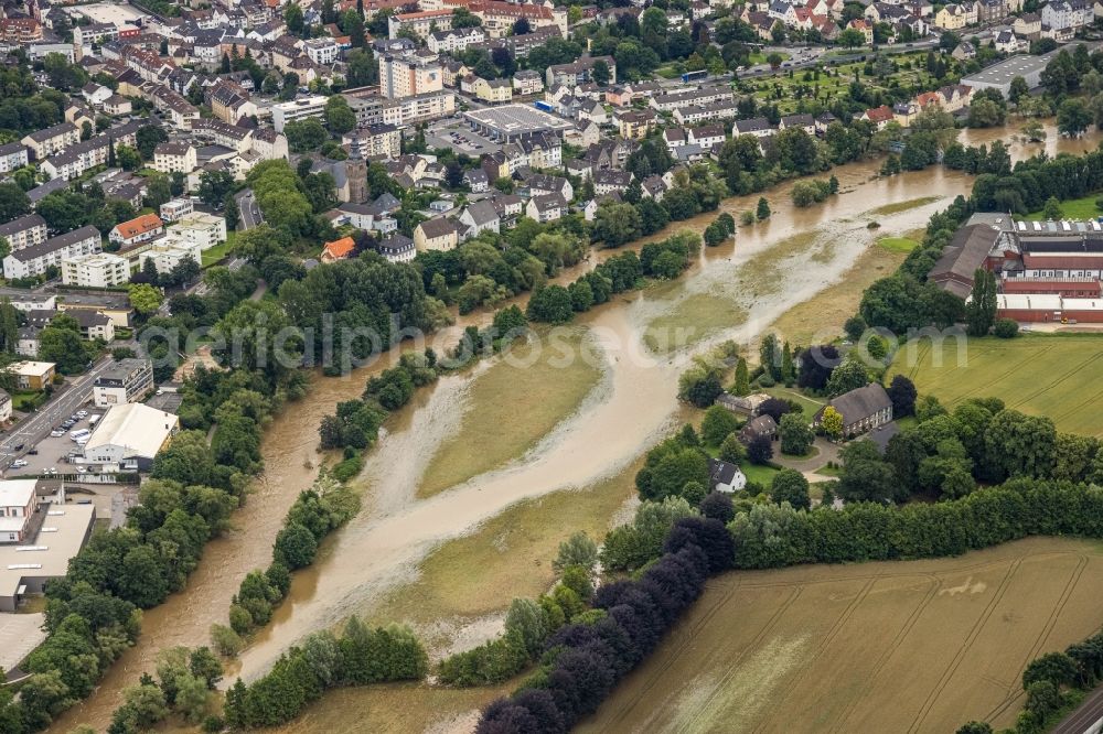 Aerial photograph Hagen - Flood situation and flooding, all-rousing and infrastructure-destroying masses of brown water in the district Hohenlimburg in Hagen at Ruhrgebiet in the state North Rhine-Westphalia, Germany