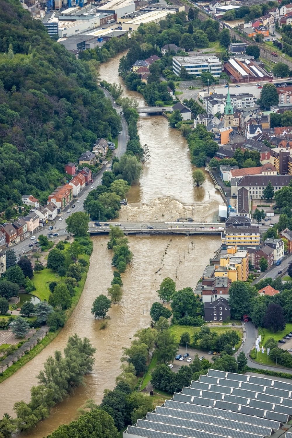 Aerial image Hagen - Flood situation and flooding, all-rousing and infrastructure-destroying masses of brown water in the district Hohenlimburg in Hagen at Ruhrgebiet in the state North Rhine-Westphalia, Germany