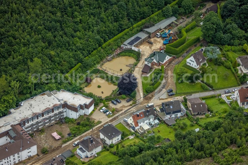 Aerial image Hagen - Flood situation and flooding, all-rousing and infrastructure-destroying masses of brown water in the district Hohenlimburg in Hagen at Ruhrgebiet in the state North Rhine-Westphalia, Germany