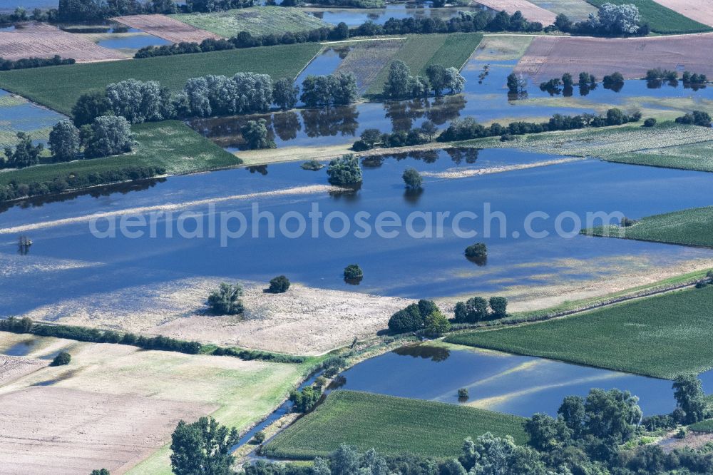 Hockenheim from the bird's eye view: Flood situation and flooding, all-rousing and infrastructure-destroying masses of brown water in Hockenheim in the state Baden-Wuerttemberg, Germany